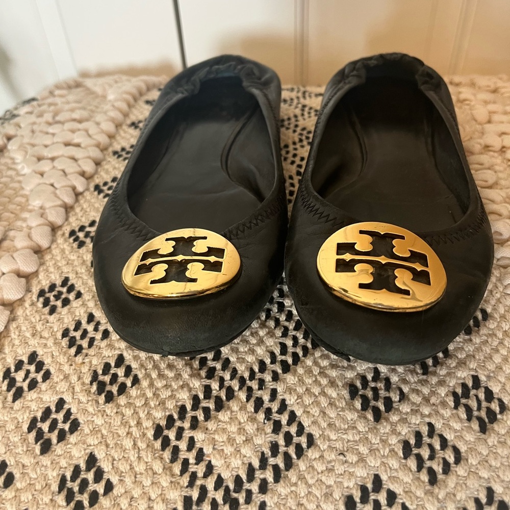 Tory Burch Black Flats with Gold Emblem - Picture 2 of 4